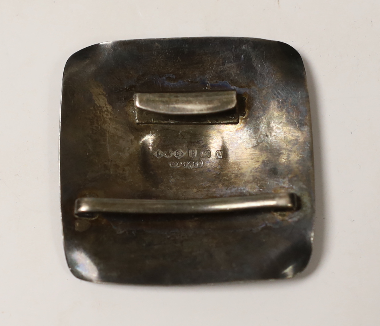 An Edwardian Arts & Crafts Liberty & Co Cymric belt buckle section (incomplete), Birmingham, 1902, 48mm.